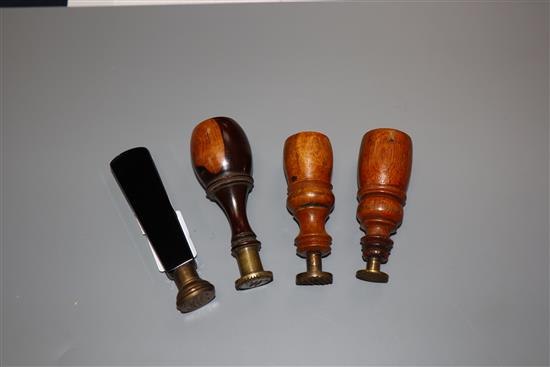 Three 19th century lignum vitae handled desk seals and a black glass handled seal